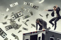 two businessmen jumping off a truck with money falling from the sky